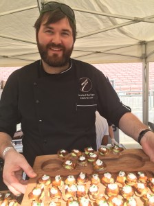 Chef Bernhard Mairinger served crispy pork belly crostini w/ fava bean and radish.