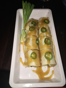 (Spring roll goes well with a Singha beer - Photo by Jill Weinlein)